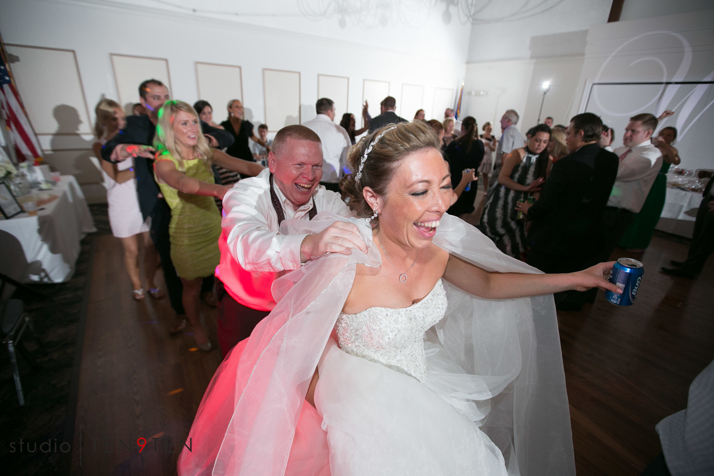 Wedding guests celebrating on the dance floor